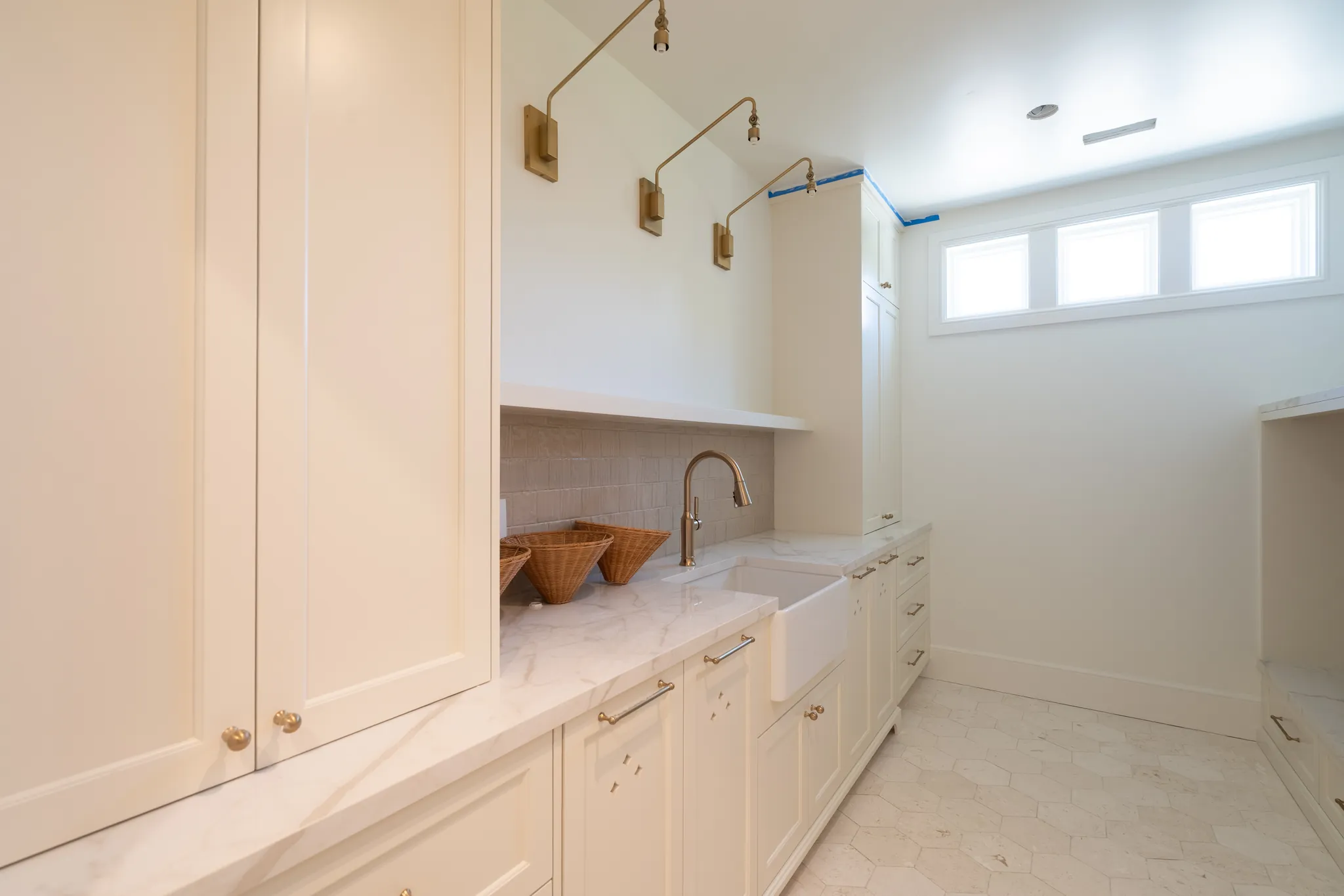 Laundry and prep room with a farmhouse sink