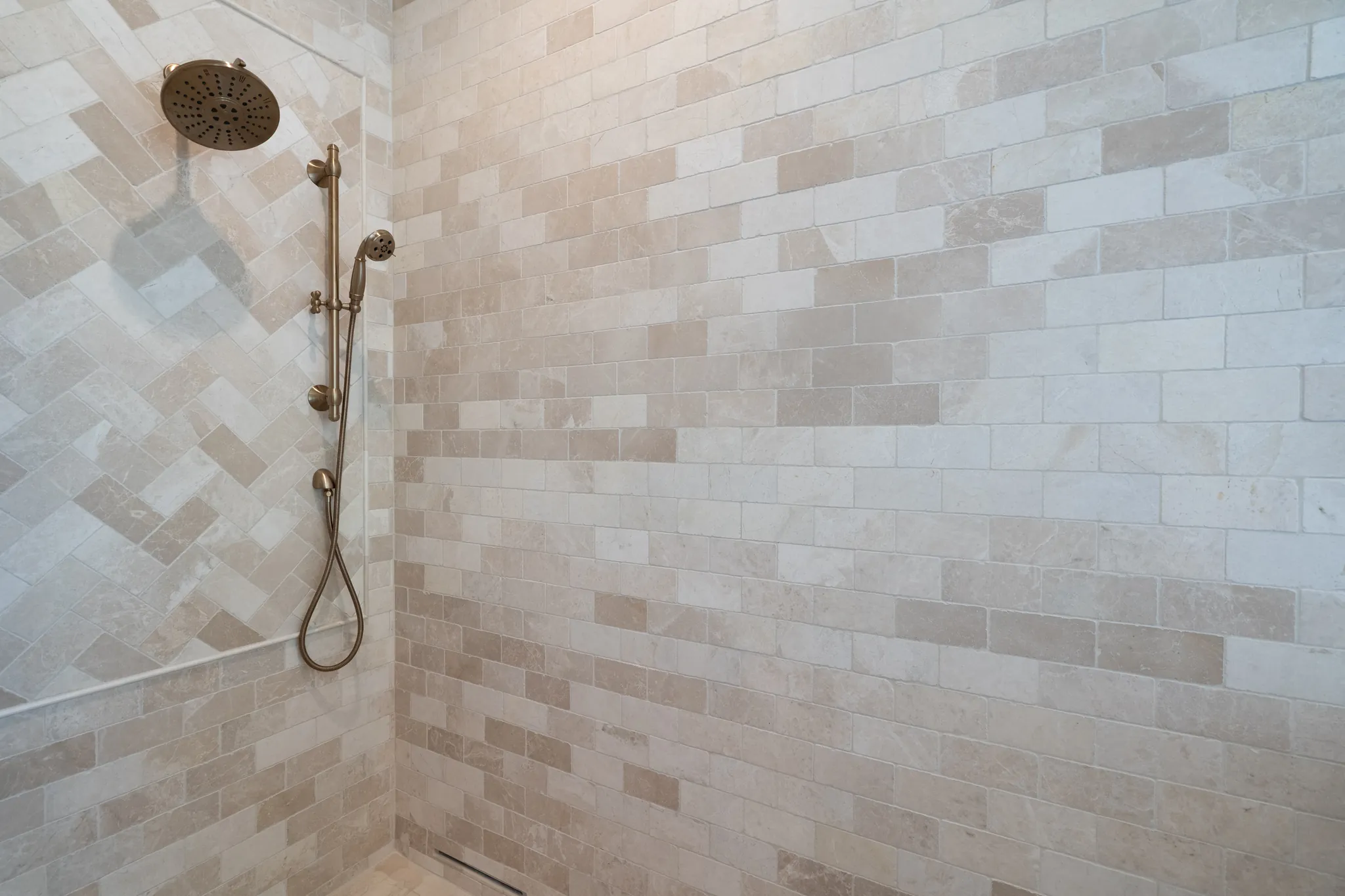 Walk-in shower with stone-look tile